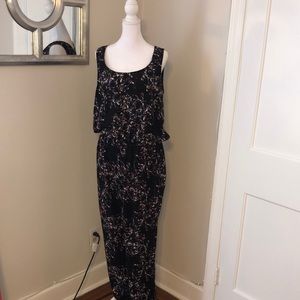 EUC multi color jumpsuit with beaded trim around the collar and armholes size 12